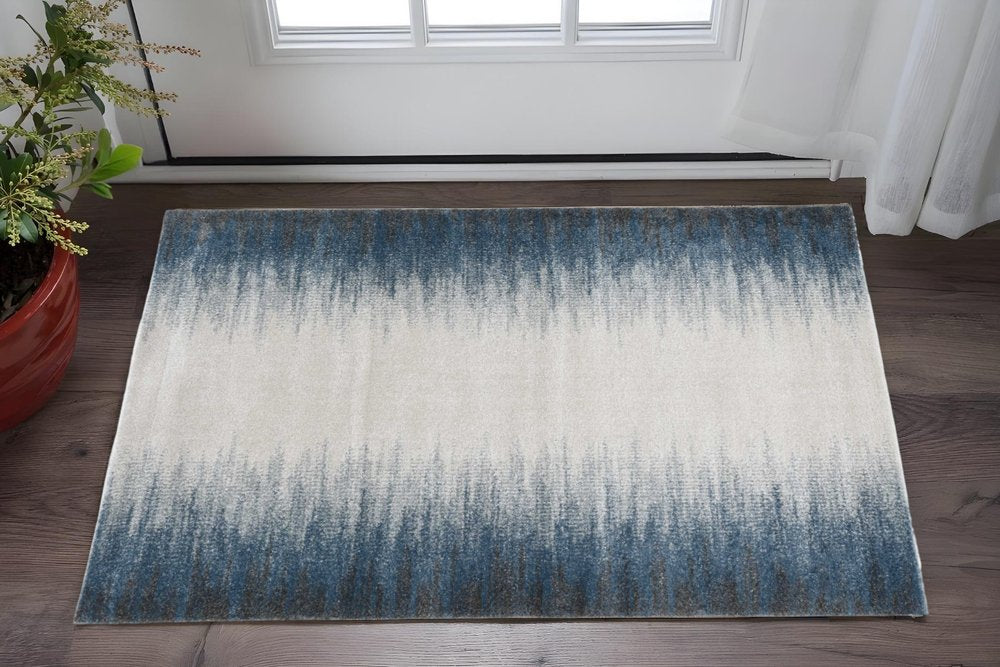 5' X 8' Ivory And Blue Abstract Area Rug