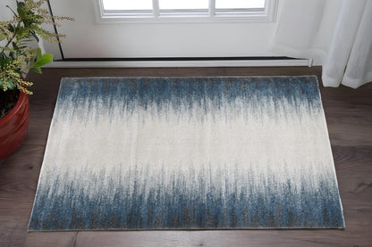 5' X 8' Ivory And Blue Abstract Area Rug