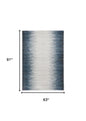 5' X 8' Ivory And Blue Abstract Area Rug