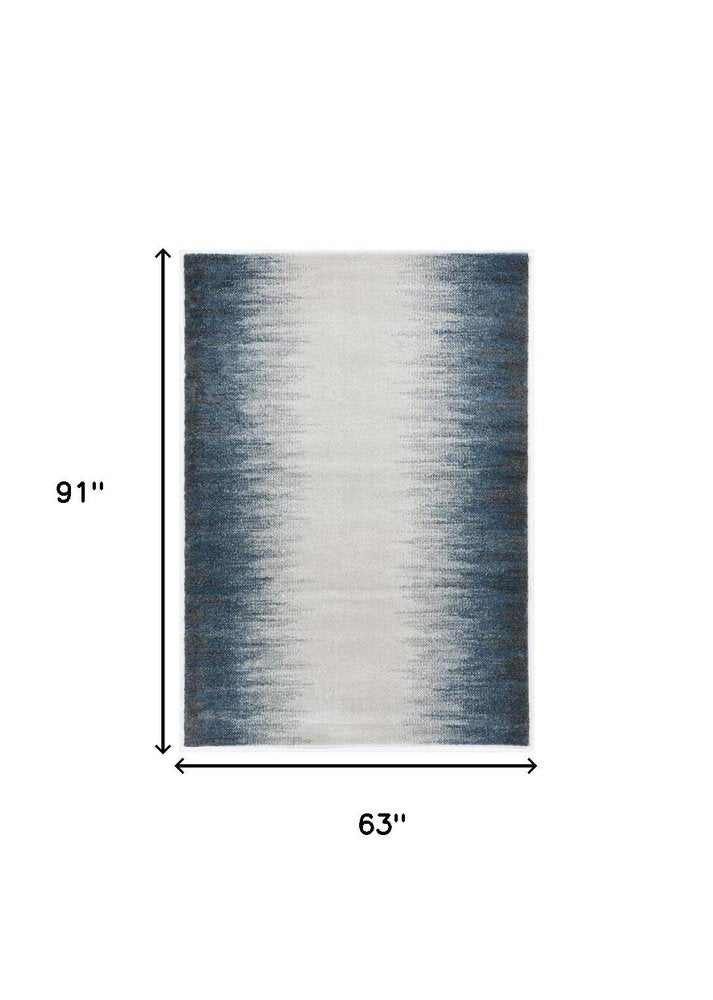 5' X 8' Ivory And Blue Abstract Area Rug