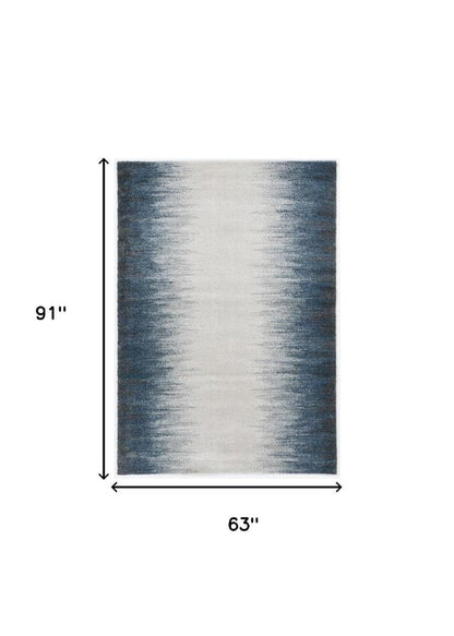 5' X 8' Ivory And Blue Abstract Area Rug