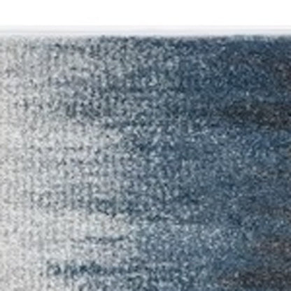 5' X 8' Ivory And Blue Abstract Area Rug