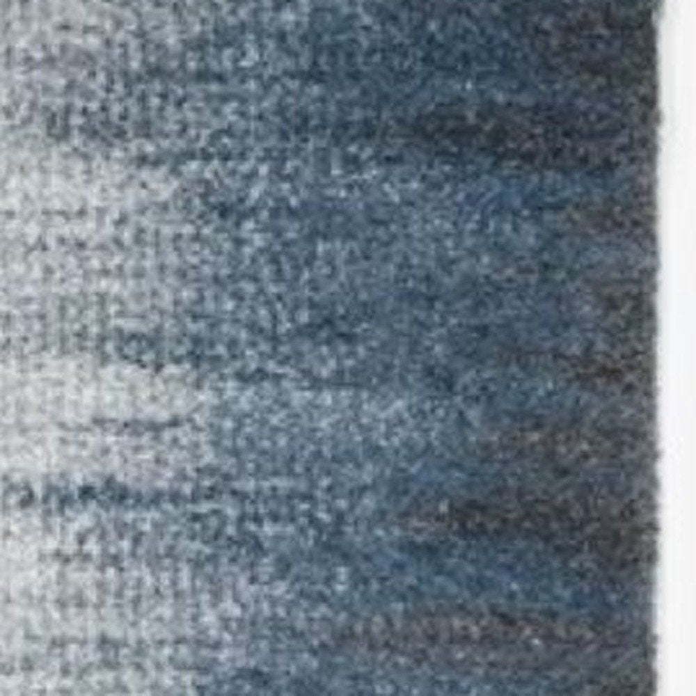 5' X 8' Ivory And Blue Abstract Area Rug