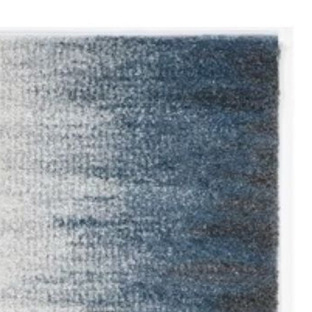 5' X 8' Ivory And Blue Abstract Area Rug
