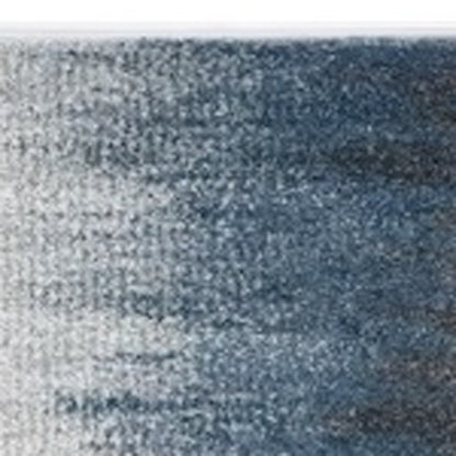 5' X 8' Ivory And Blue Abstract Area Rug
