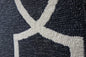 7' X 10' Onyx And White Geometric Handmade Indoor Outdoor Area Rug