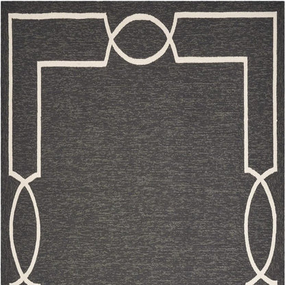 7' X 10' Onyx And White Geometric Handmade Indoor Outdoor Area Rug