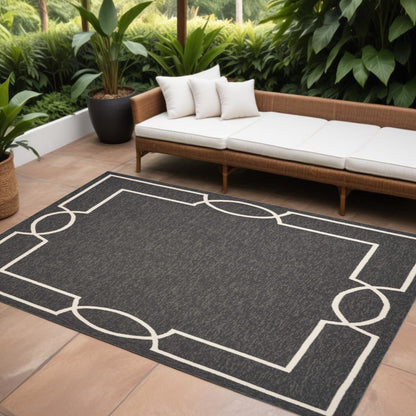 7' X 10' Black And White Geometric Indoor Outdoor Area Rug