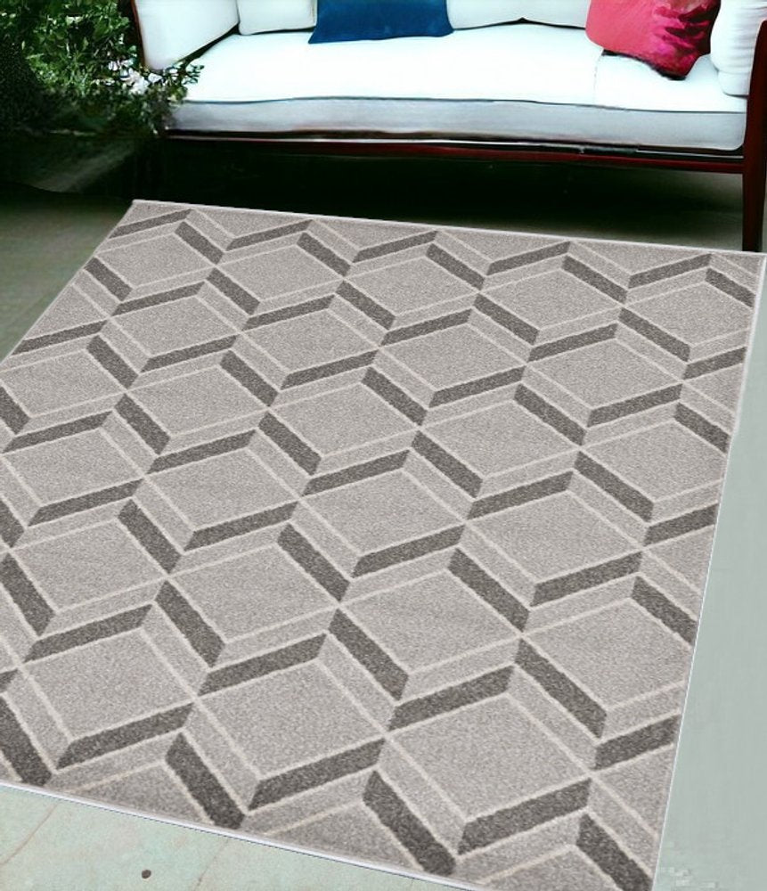 2' X 4' Green And Ivory Geometric Indoor Outdoor Area Rug