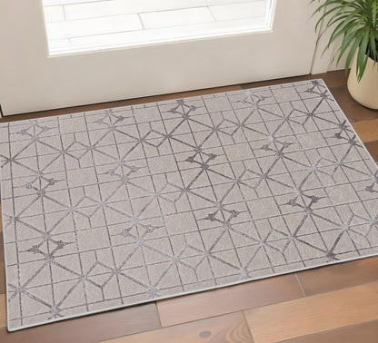 8' X 11' Ivory And Brown Geometric Area Rug