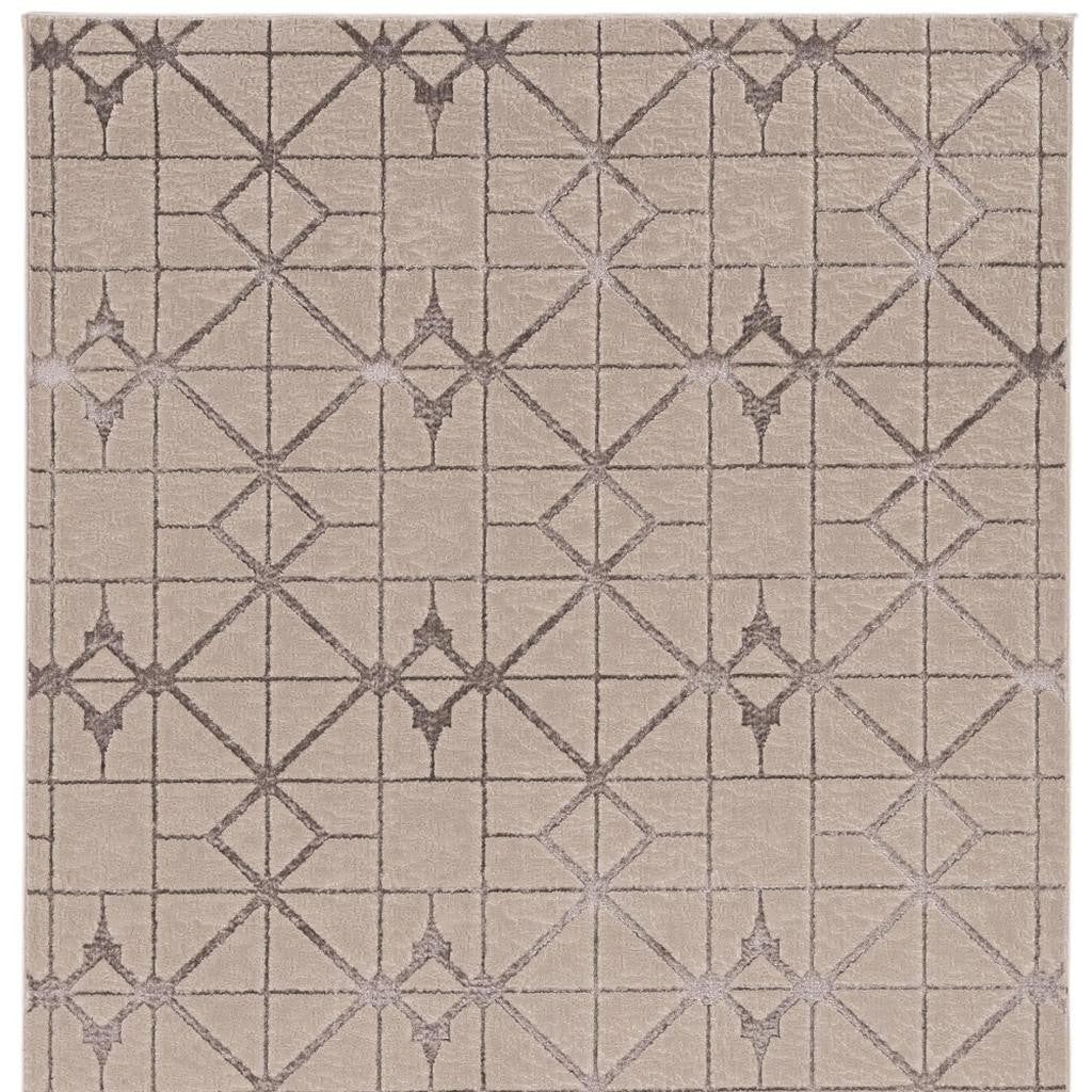 7' X 10' Ivory And Brown Geometric Area Rug