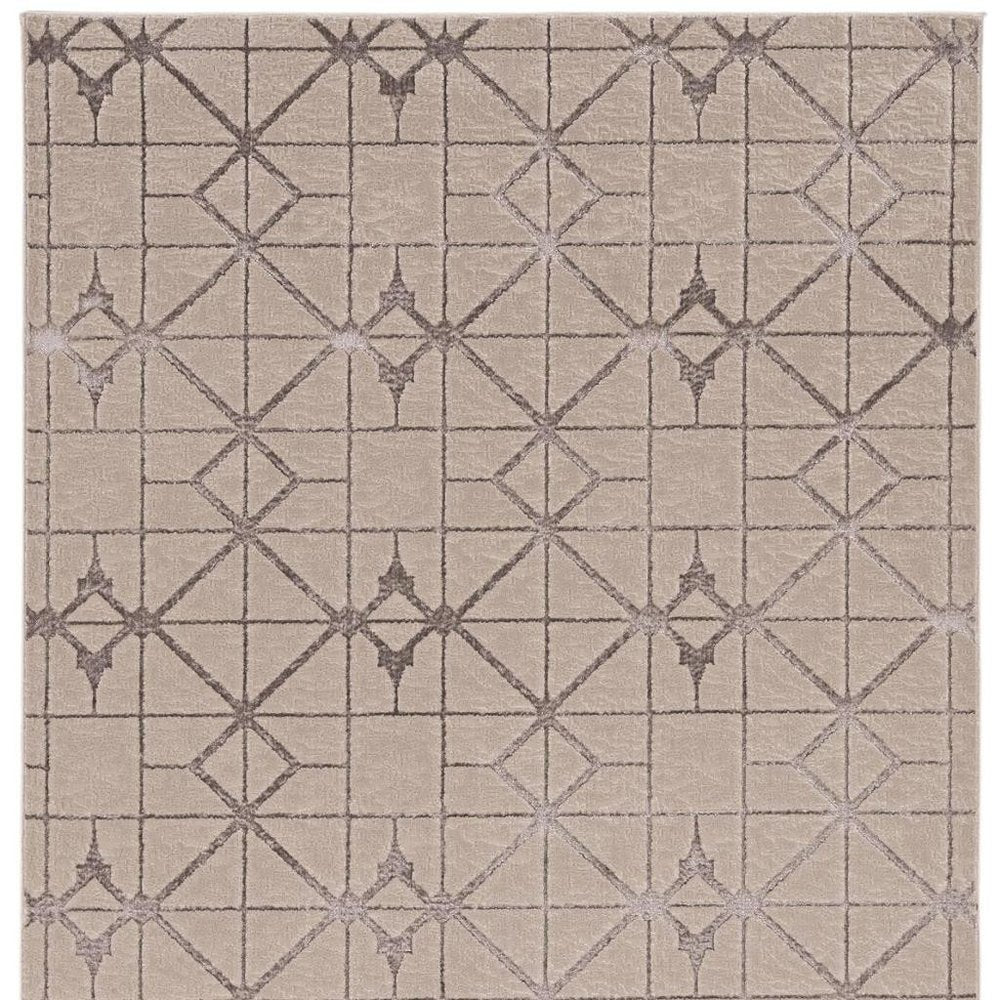 7' X 10' Ivory And Brown Geometric Area Rug