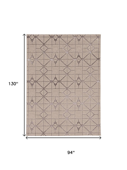 7' X 10' Ivory And Brown Geometric Area Rug
