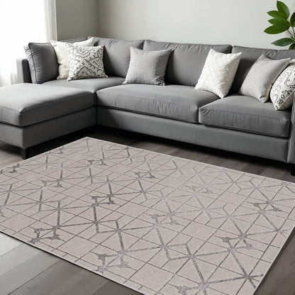 7' X 10' Ivory And Brown Geometric Area Rug