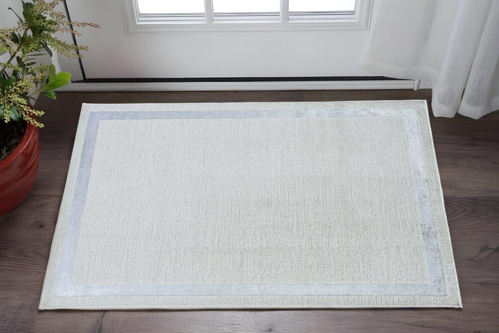 10' X 13' Ivory And Silver Abstract Area Rug