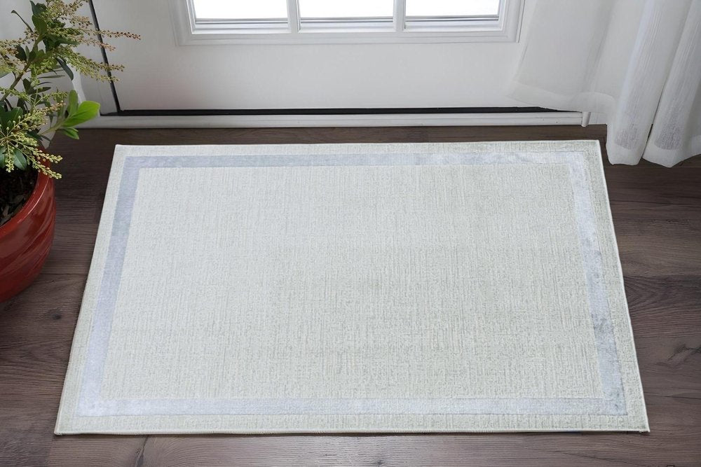 8' X 11' Ivory And Silver Abstract Area Rug