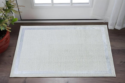 8' X 11' Ivory And Silver Abstract Area Rug