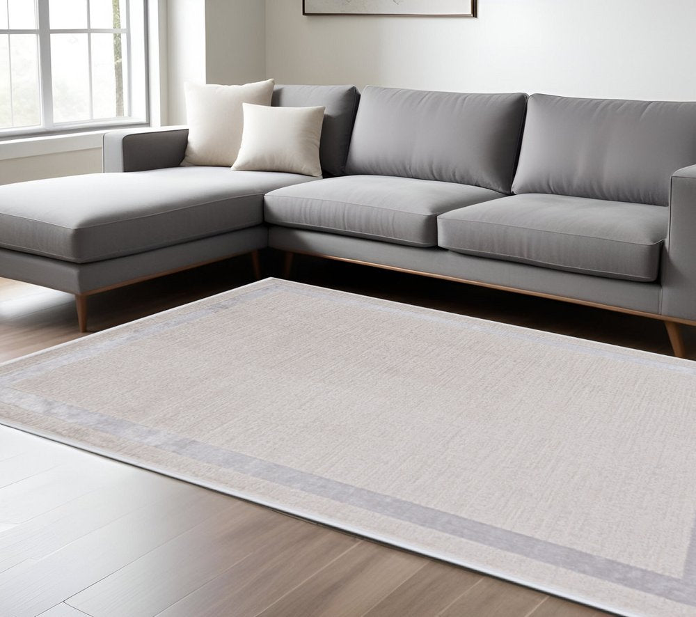 8' X 11' Ivory And Silver Abstract Area Rug