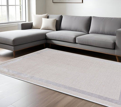 8' X 11' Ivory And Silver Abstract Area Rug