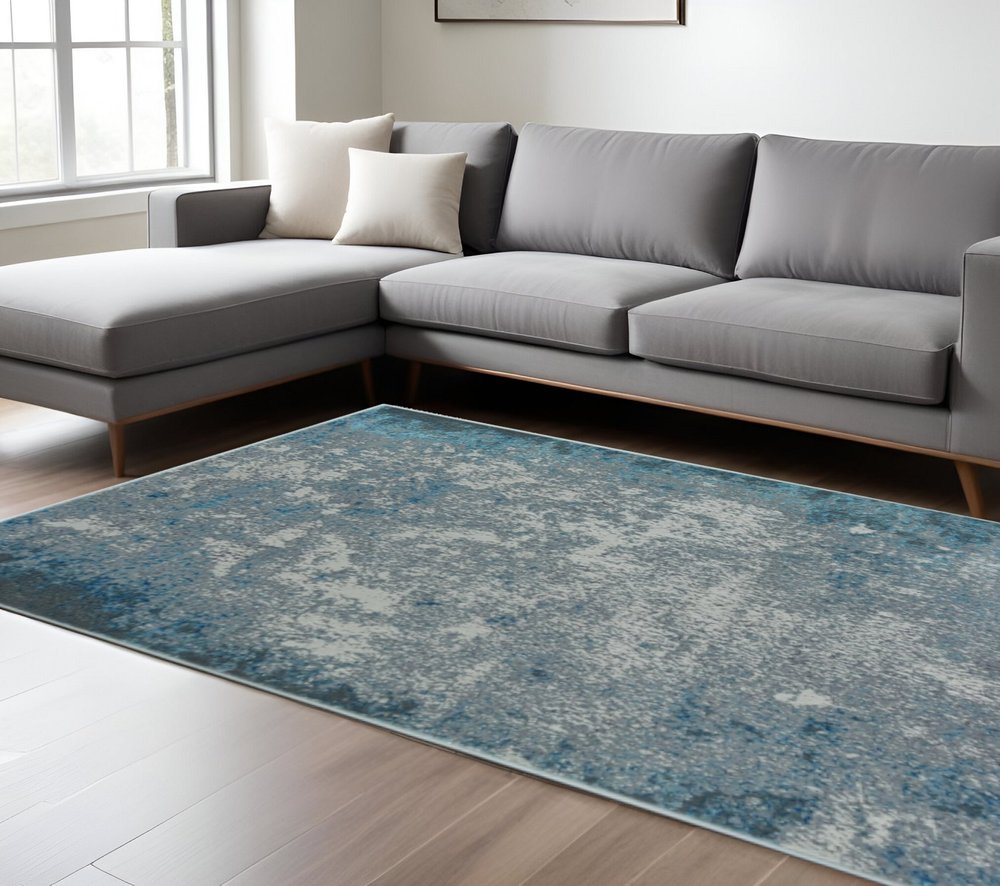 5' X 8' Silver And Blue Abstract Area Rug