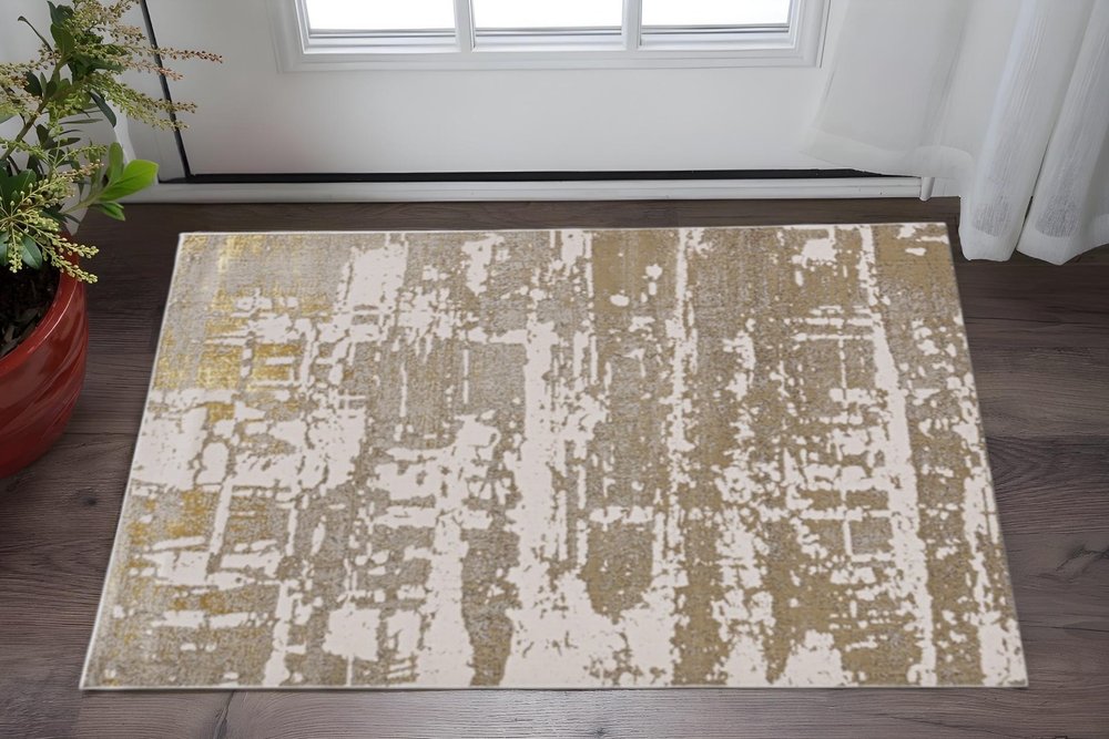 7' X 10' Ivory Taupe And Gold Abstract Area Rug