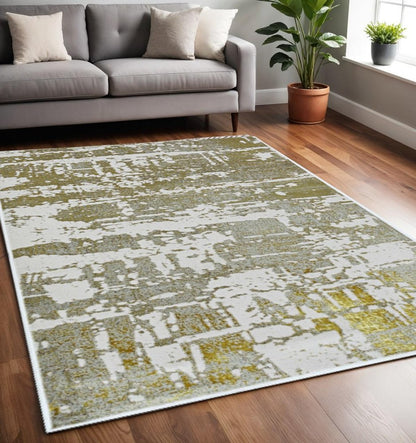 10' X 13' Ivory Taupe And Gold Abstract Area Rug