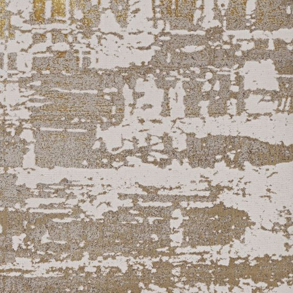 7' X 10' Ivory Taupe And Gold Abstract Area Rug
