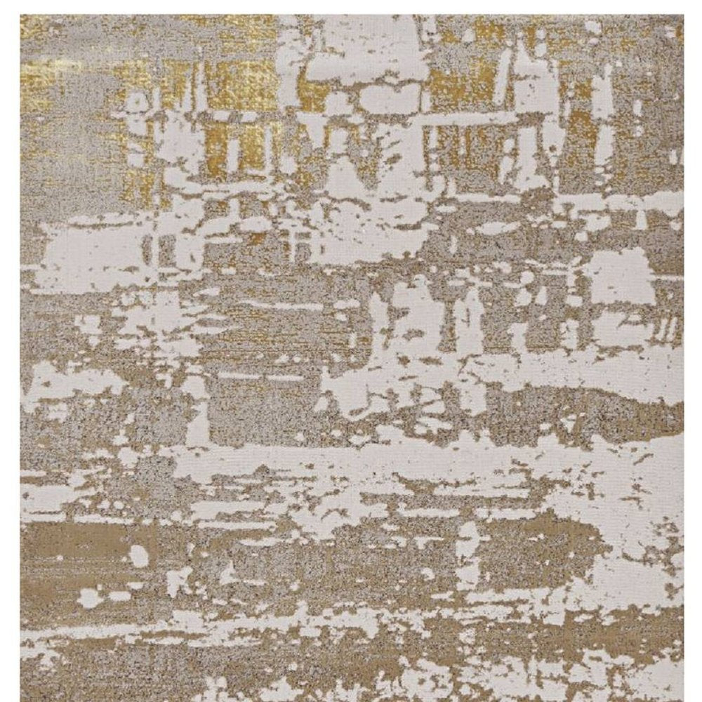 7' X 10' Ivory Taupe And Gold Abstract Area Rug