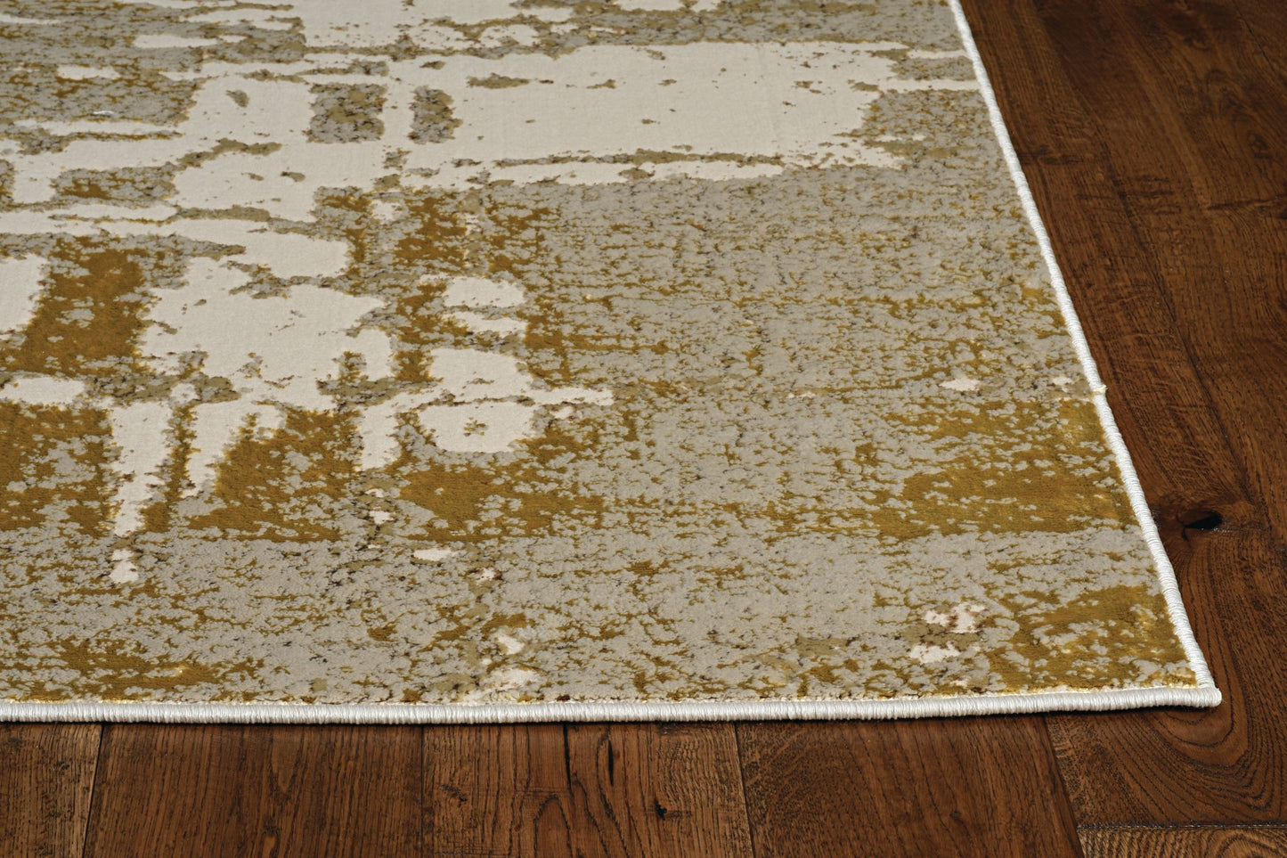 7' X 10' Ivory Taupe And Gold Abstract Area Rug
