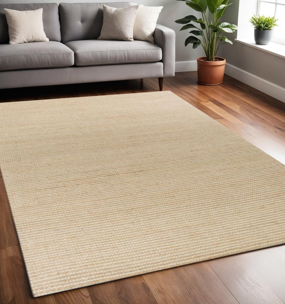 8' X 11' Tan And Ivory Hand Woven Area Rug