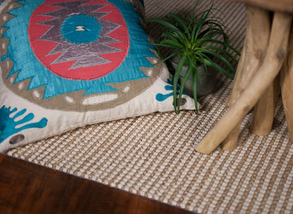5' X 7' Tan And Ivory Hand Woven Area Rug