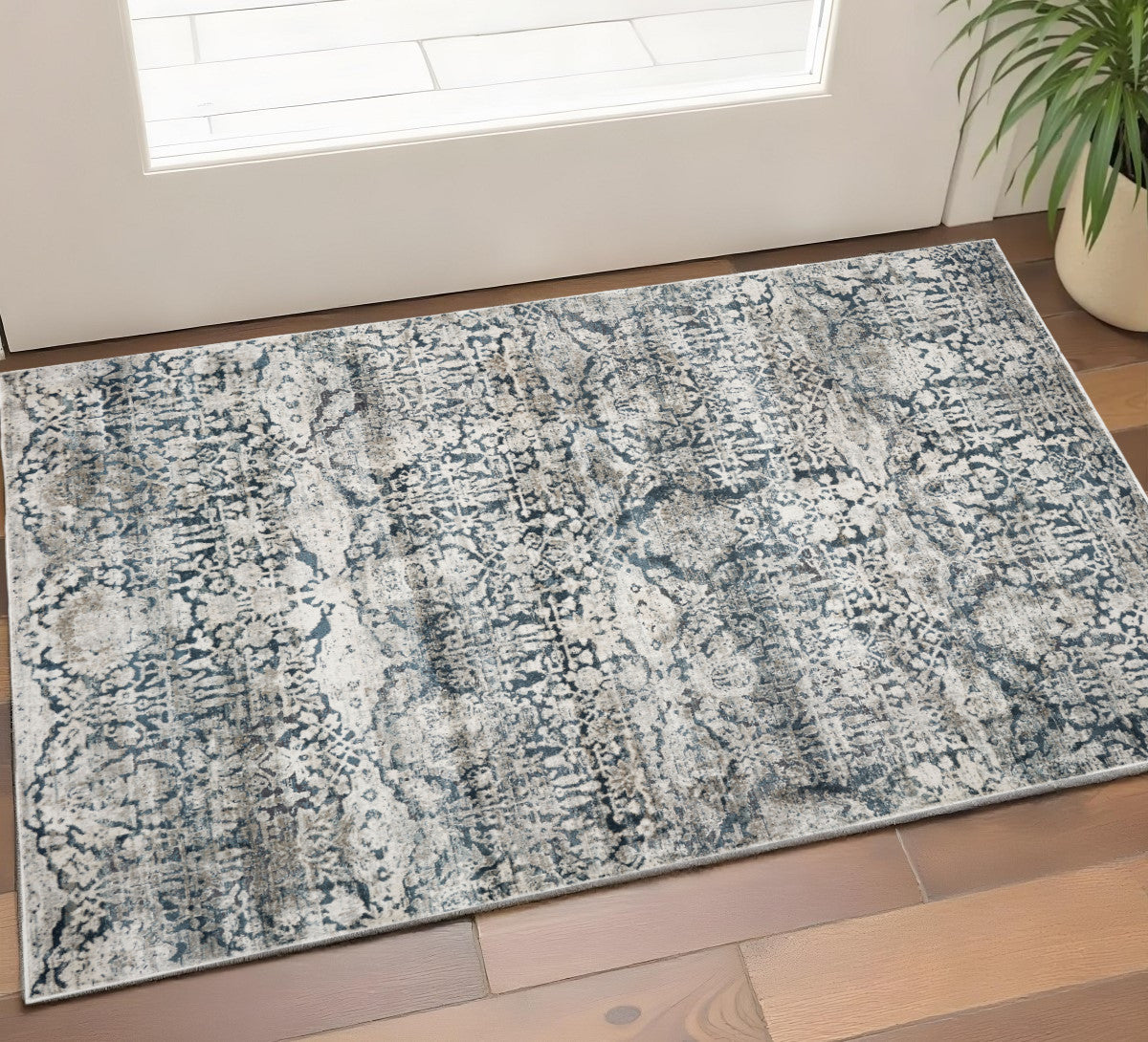 3' X 5' Teal And Ivory Floral Area Rug