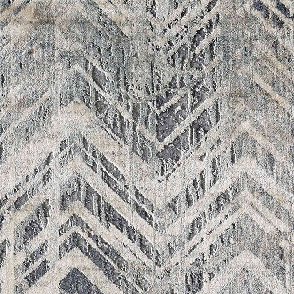 9' X 13' Dark Gray And Ivory Chevron Area Rug