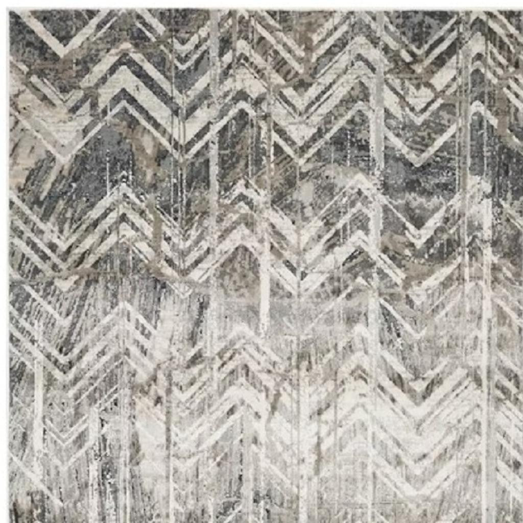 9' X 13' Dark Gray And Ivory Chevron Area Rug