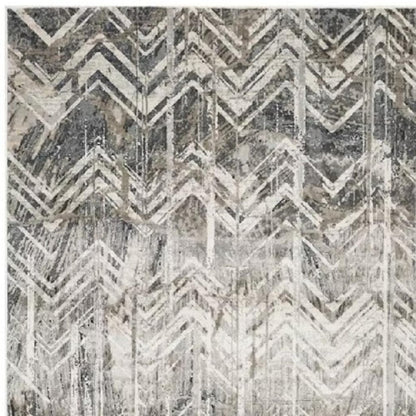 9' X 13' Dark Gray And Ivory Chevron Area Rug
