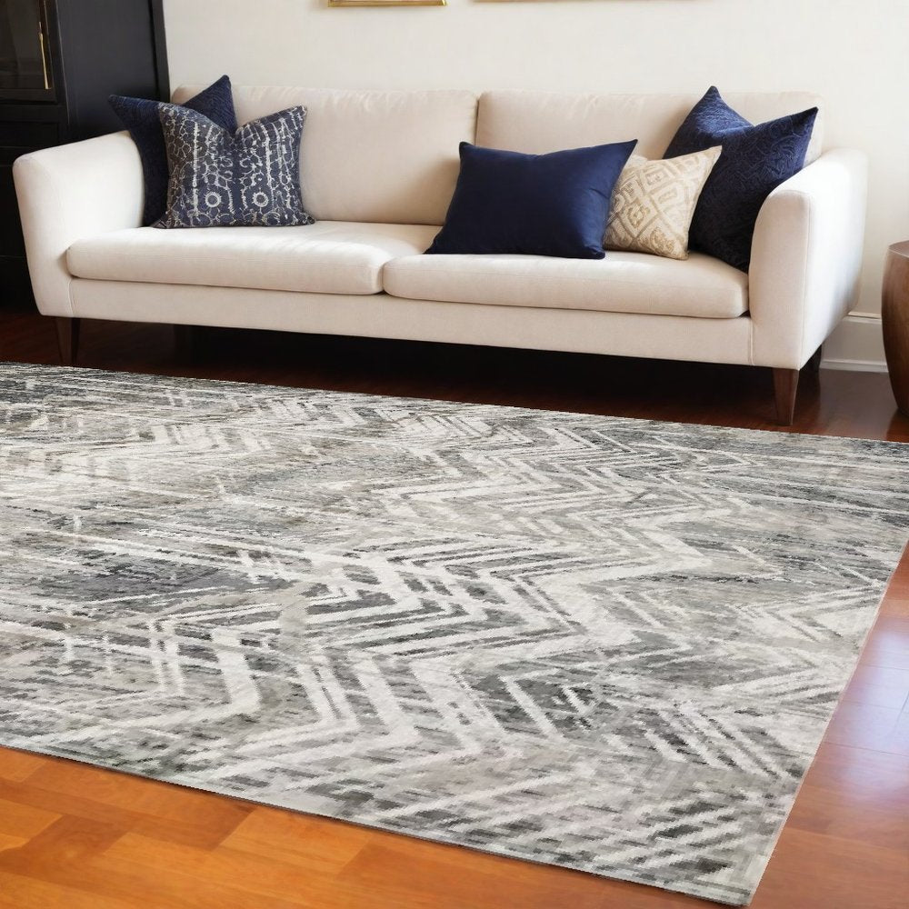 9' X 13' Dark Gray And Ivory Chevron Area Rug