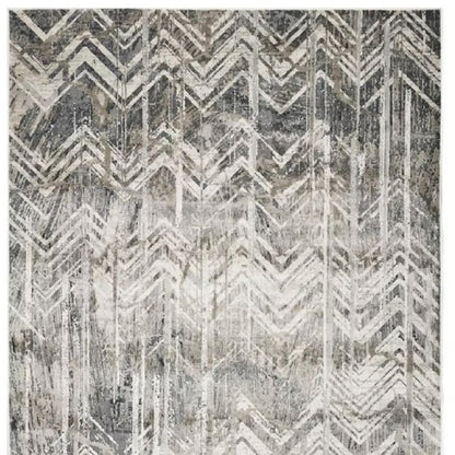 9' X 13' Dark Gray And Ivory Chevron Area Rug