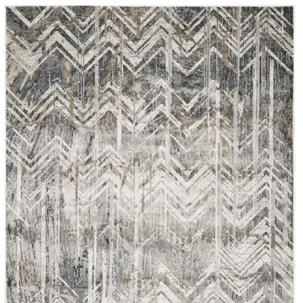 9' X 13' Dark Gray And Ivory Chevron Area Rug