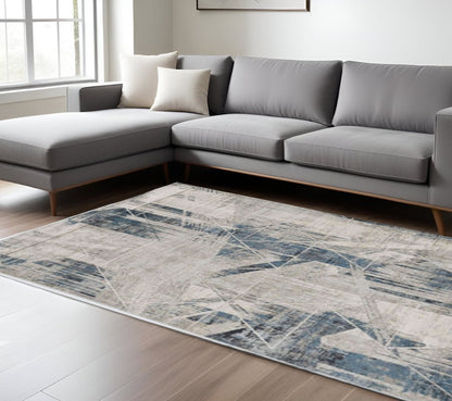 9' X 13' Blue And Gray Abstract Geometric Area Rug