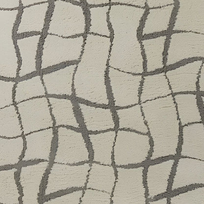 3' X 5' Ivory And Dark Gray Abstract Shag Area Rug