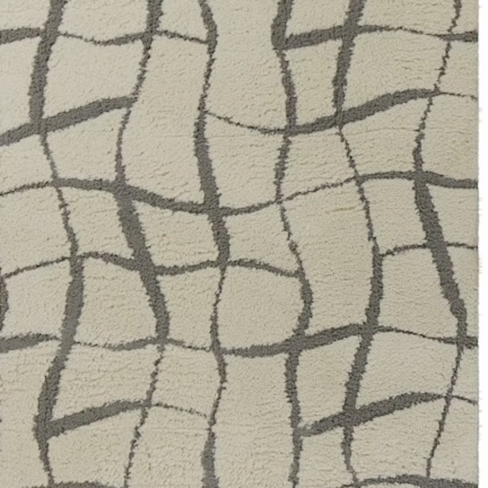 3' X 5' Ivory Abstract Shag Area Rug