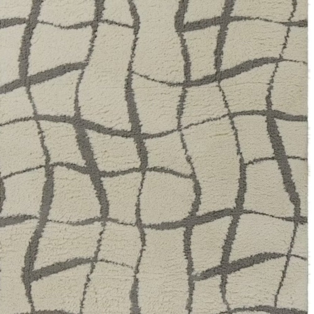 3' X 5' Ivory And Dark Gray Abstract Shag Area Rug