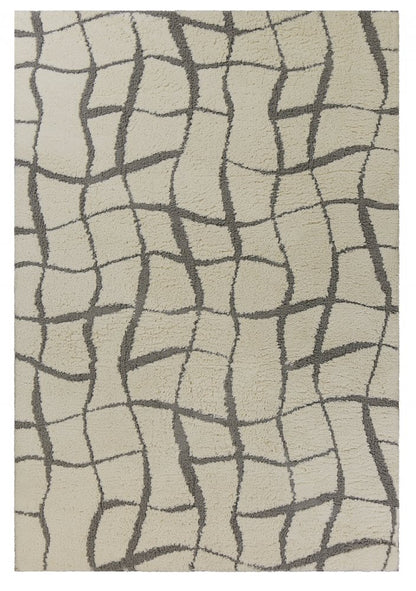 3' X 5' Ivory And Dark Gray Abstract Shag Area Rug