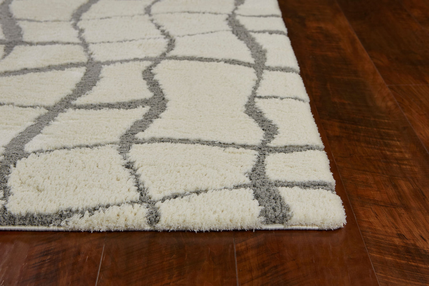 3' X 5' Ivory Abstract Shag Area Rug