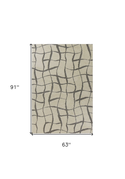 3' X 5' Ivory Abstract Shag Area Rug