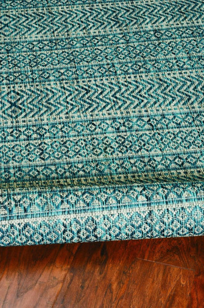 8' X 11' Teal And Beige Geometric Area Rug