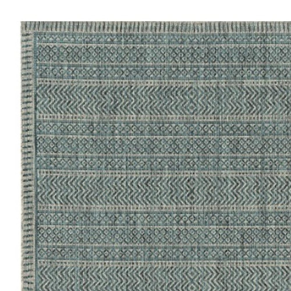 8' X 11' Teal And Beige Geometric Area Rug