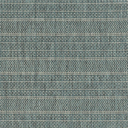 8' X 11' Teal And Beige Geometric Area Rug