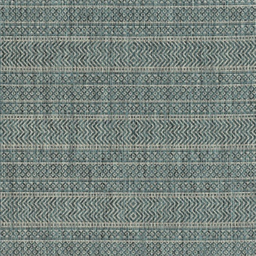 8' X 11' Teal And Beige Geometric Area Rug