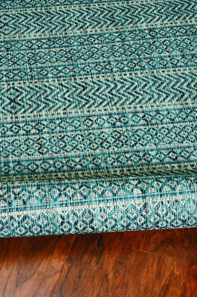 8' X 11' Teal And Beige Geometric Area Rug